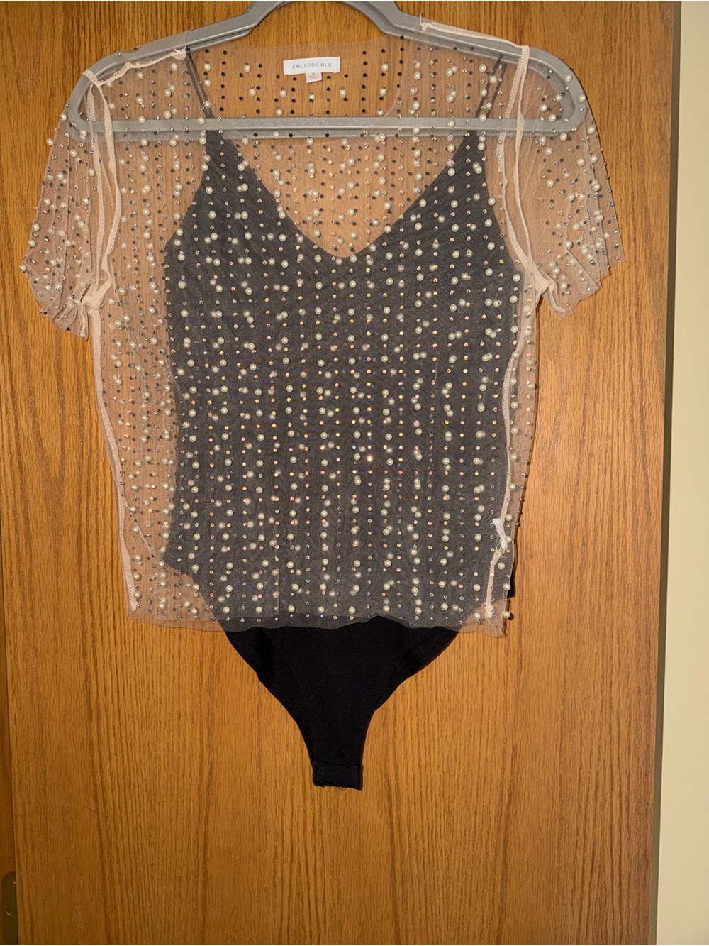 Buckle Black Bodysuit with Nude Pearl-Studded Mesh Overlay